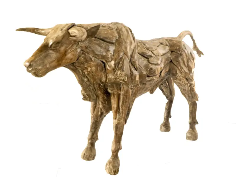 Product image 1 of the product “Standing Bull - Head up. Artistic made made from single teak wood pieces. The head is carved wood. About 240cm length and 125cm height ”